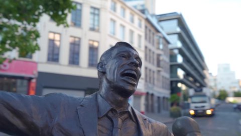 Brussels , Belgium - 07 29 2020: L'Envol (The Flight) in Brussels Belgium, bronze statue of Belgian singer Jacques Brel, sculpted by Tom Frantzen. Located at Oud Korenhuis, the Place de la Vieille Hal