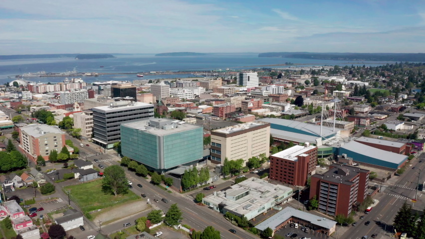 Over the urban core of Everett WA in Puget Sound with Mt Baker in the background