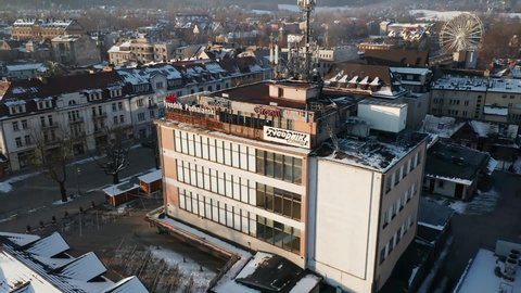 Zakopane , Malopolska , Poland - 04 08 2021: Aerial View Of Tygodnik Podhalanski Building, Newspaper Publication Company In Zakopane, Poland. drone tilt-down