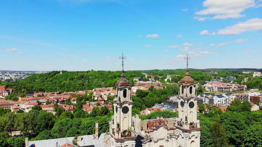 Tilt down view Lord Ascension (towered) church in Vilnius, Lithuania. Royalty-Free Stock Footage #1074064154