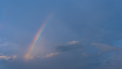 Timelapse of cloud cluster formation and the appearance and disappearing of a rainbow