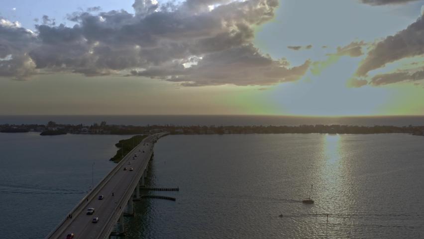 Drone slow pan over bridge at sunset. Largo, Clearwater, Tampa Florida.