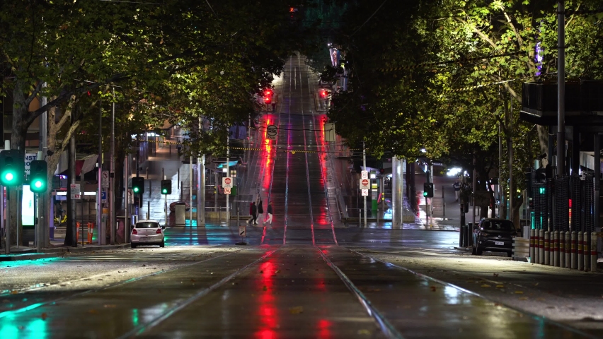 Someone stops to take a photo of Melbourne at a standstill during the nightly coronavirus curfew restrictions as COVID-19 continues to spread across Australia.
