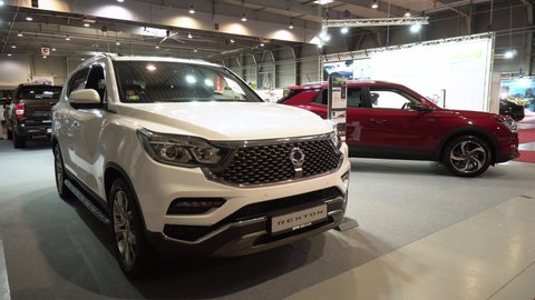 PRAGUE, CZECH REPUBLIC - AUGUST 28, 2020: Front view of a white SsangYong Rexton at a car exhibition - other cars in the background
