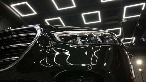 Lutsk, Volyn  Ukraine - February 23, 2021: Mercedes-Benz S-Class W223 the new car front of the body. Shown are the headlights, emblem, bumper and grille.