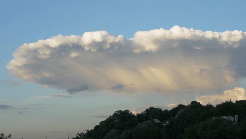 A large cloud over the island, a strange extraordinary cloud in the sky.
