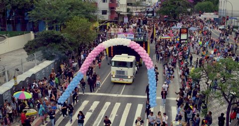 São Paulo , Brazil - 05 29 2016: Aerial rising over Consolacao Street during gay parade. Sao Paulo.