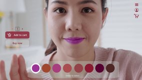 POV asia young teen girl relax happy smile enjoy buy home apply lips makeup ai ar vr mixed augmented reality e-commerce store future fashion mall app in iot smart touch swipe select color web screen.