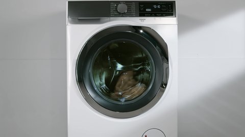 wash machine, Clothes washing machine in laundry room interior.