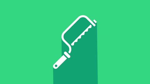 White Hacksaw icon isolated on green background. Metal saw for wood and metal. 4K Video motion graphic animation.