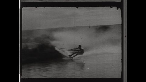 1950s Tampa Bay, FL. Stuntman Rides Wake Board in Drainage Ditch. The Daredevil Crashes in the Water, 4K Overscan of Vintage Archival 16mm Film Print