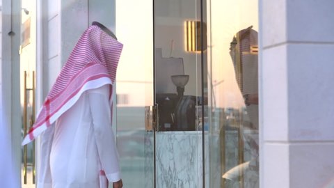 A person wearing the Saudi thobe