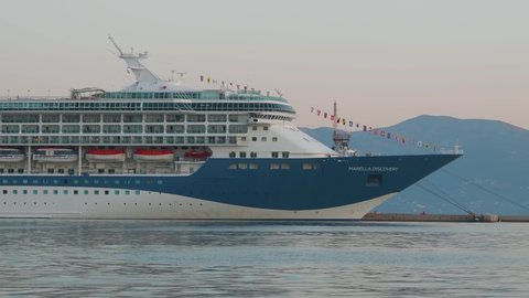 CORFU, GREECE, SEPTEMBER 27, 2019: Tui Marella Discovery cruise anchored in city port.