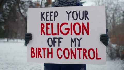 Religion Protest With Keep Your Religion Off My Birth Control Slogan. Religion Protest In Defense Of Reproductive Rights. Religion Protest For Women’s Reproductive Freedom. Human Rights.