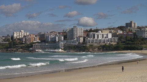 SYDNEY, NSW, AUSTRALIA, JUNE 11 2021. Bondi beach apartments in Australian winter, slow motion.