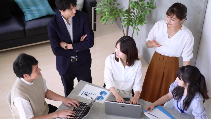 Business persons working in an office Royalty-Free Stock Footage #1074187700