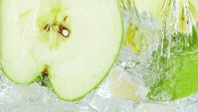 Super Slow Motion Shot of Pouring Water on Apple Slices and Ice Cubes in Glass at 1000 fps. - Powered by Shutterstock - Get 15% off with code: PIKWIZARD15