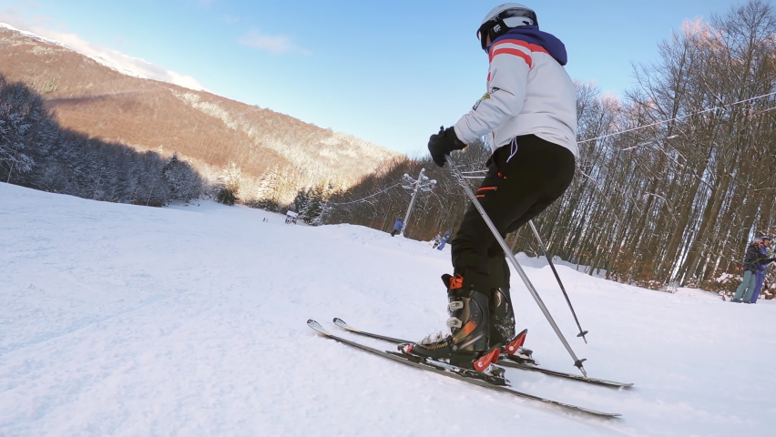 side following expert alpine skier skiing Stock Footage Video (100 
