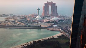 Al Marina island and shopping mall in downtown Abu Dhabi in United Arab Emirates sunset time lapse video