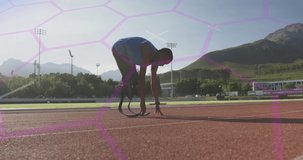 Animation of digital data processing over disabled male athlete with running blades on racing track. global sports, competition, disability and digital interface concept digitally generated video.