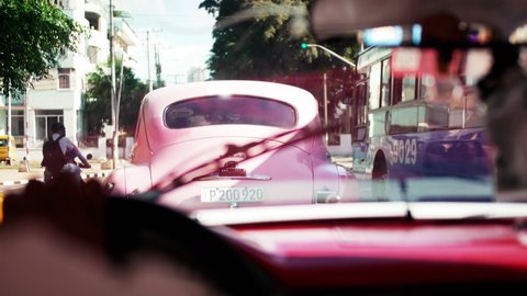 Havana , Cuba - 03 09 2021: Riding in the back of a Cuban taxi through the streets of Havana Cuba