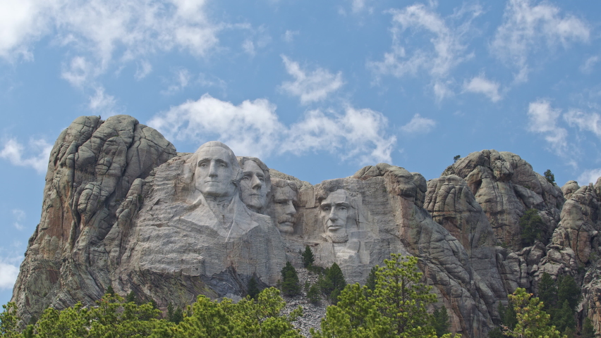 Clouds moving over Mount Rushmore in the Black Hills during timelapse in South Dakota, U.S. presidents George Washington, Thomas Jefferson, Theodore Roosevelt and Abraham Lincoln.