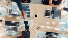 Creative visual of business people in corporate staff meeting . Concept of digital technology for marketing data analysis and investment decision making . - Powered by Shutterstock - Get 15% off with code: PIKWIZARD15