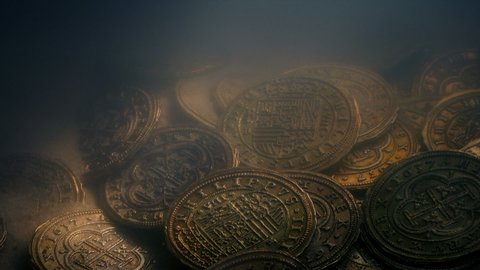 Treasure Coins Underwater In Ray Of Sunlight