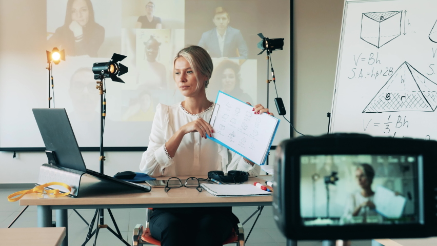 Online learning, online education, distance learning, distance education concept. A lady is explaining geometry during online class
