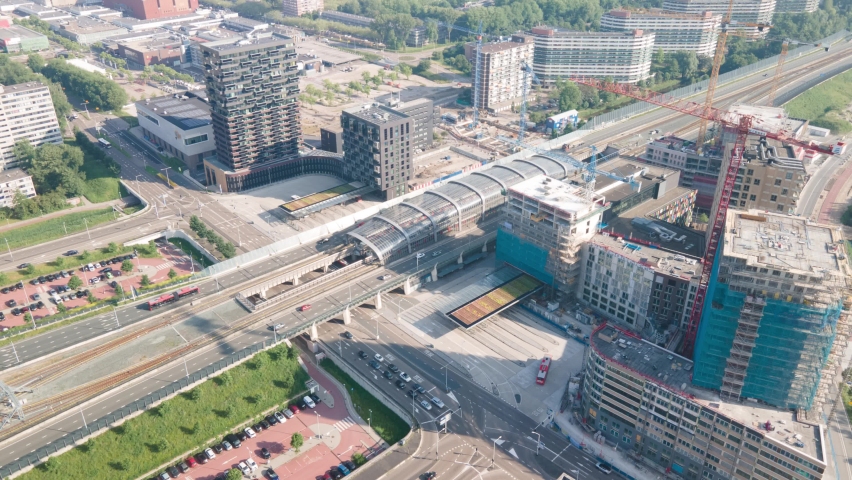 Hyperlapse aerial timelaps of Station Noord. metro station north of the Noord Zuid lijn, a hyperlapse, aerial timelapse. with busstation and road with traffic.