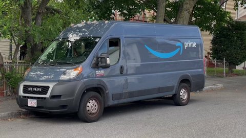 Amazon Prime delivery truck on local street parking lights blinking, Revere Massachusetts USA, June 6 2021