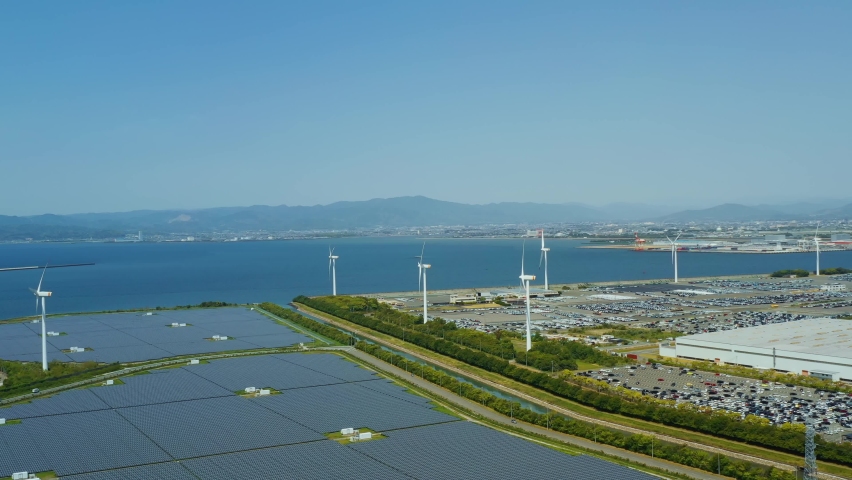 Solar power plant and Windmills aerial view. Renewable energy. Green tech. Royalty-Free Stock Footage #1074278564