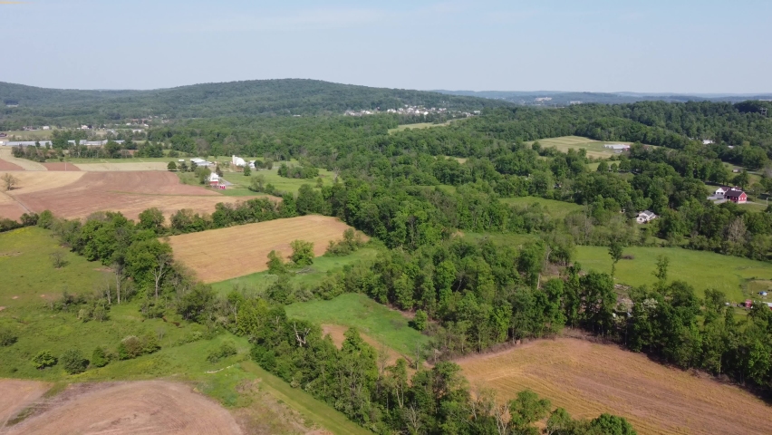 Flying over the forested countryside of the state of Pennsylvania.