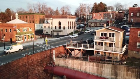 Wappingers Falls , New York , United States - 12 30 2020: Downtown Wappingers Falls is shown in this aerial 1080 footage as the drone rises.