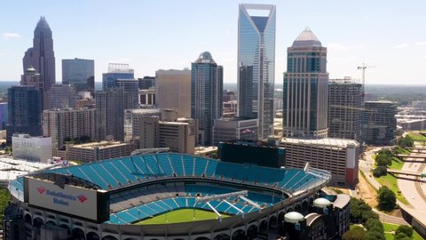 Charlotte , North Carolina , United States - 07 21 2019: American City Skyline and Sports Stadium in North Carolina. Aerial