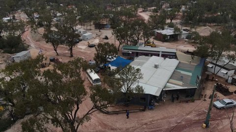 Panning aerial view of a small mining town in the opal capital of the world Lightning Ridge New South Wales Australia