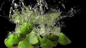 Super slow motion pieces of pear fall under the water with air bubbles. On a black background.Filmed on a high-speed camera at 1000 fps. High quality FullHD footage - Powered by Shutterstock - Get 15% off with code: PIKWIZARD15
