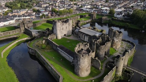 Medieval defensive architecture Caerphilly Castle, Wales, aerial circling shot
