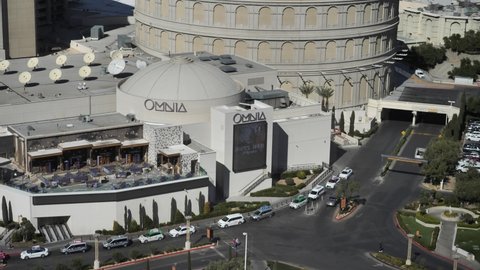 Las Vegas , Nevada , United States - 04 08 2021: Omnia Nightclub Building Caesars Palace Las Vegas Hotel and Casino Entertainment Venue and Daily Traffic, Slow Motion