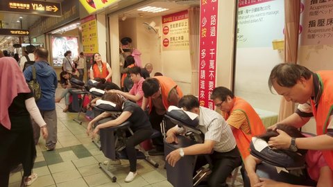MS View of people using massage service, Taipei, Taiwan - April, 21st, 2019
