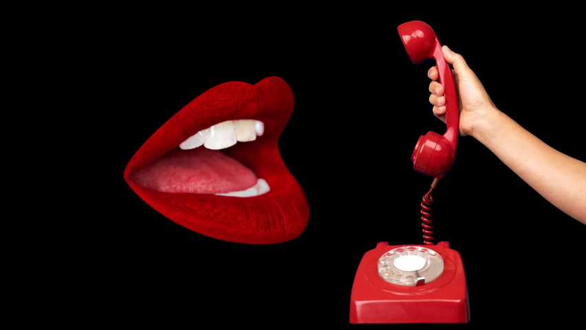 Female red lips facing each other and taking on an old fashioned dial phone