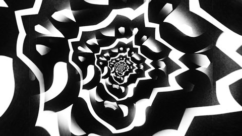 Abstract kaleidoscope motion background with moving ornaments. Motion. Black and white circular changing shapes, seamless loop.