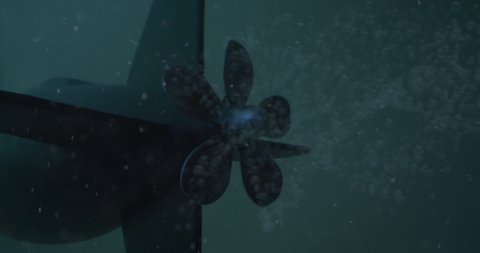 Submarine in deep water traveling away.