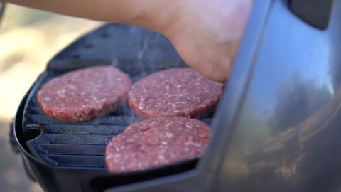 Cooking Burger Meat Patties On Barbie - Outdoor BBQ Barbecue.