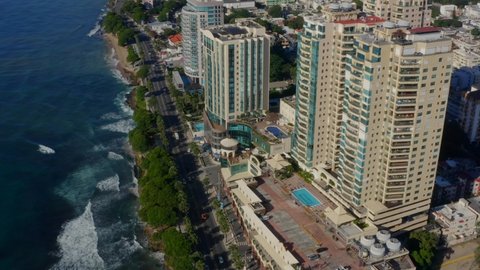Hotel And Residences Buildings Along Esplanade Of Malecon In Santo Domingo , DR. - aerial