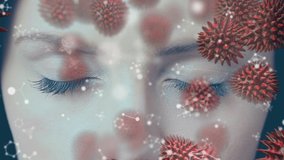 Animation of covid 19 cells and molecules over woman's face. global science, research, data processing and technology during covid 19 pandemic concept digitally generated video.