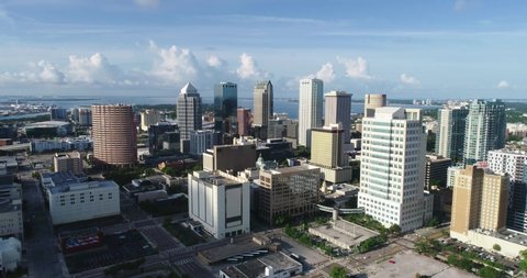 Tampa , FL , United States - 06 12 2021: Aerial push-in video clip through skyscrapers in downtown Tampa.