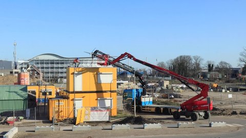 Zutphen , Gelderland , Netherlands - 03 29 2021: Dismantling of on location head office and replacement of portable workplace container