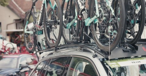 NOVO MESTO, SLOVENIA - JUNE 13 2021: Team car bikes at cycling Tour