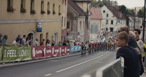 NOVO MESTO, SLOVENIA - JUNE 13 2021: Peloton cycling group at Tour